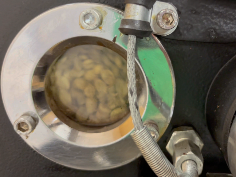 View window on our Rosatamax Coffee machine seeing the beans being roasted.
